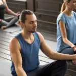 group_young_sporty_people_sitting_sukhasana_close_up_1163_4946_5a13e418b5